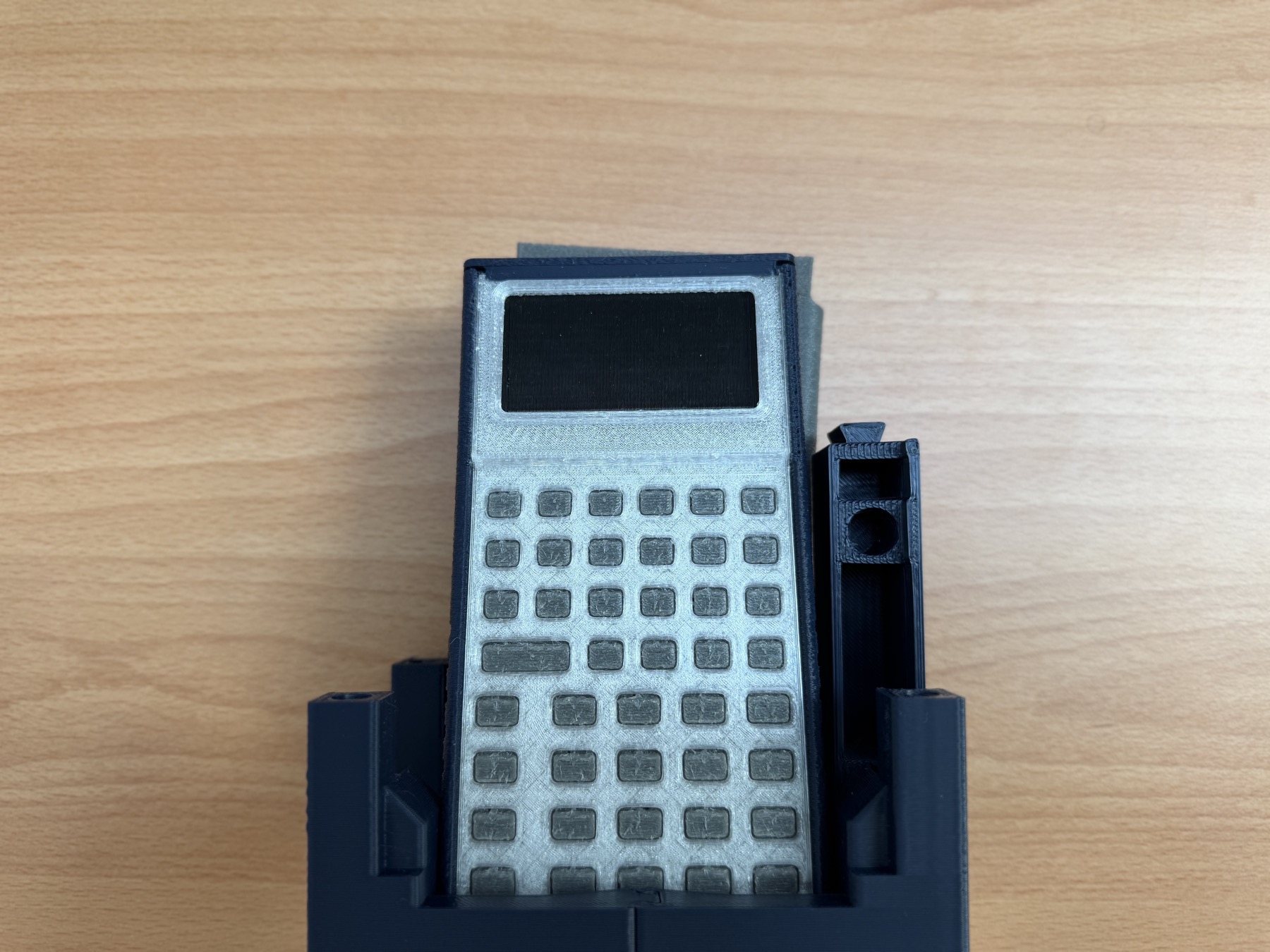 Printed StackCalc prototype in its shelf stand